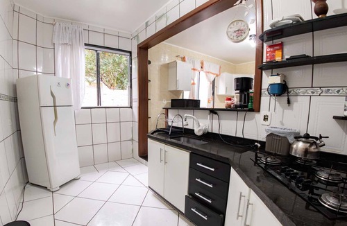 Petropolis House | Casa em Passo Fundo com Churrasqueira
