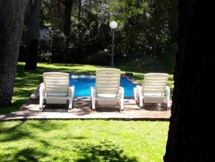 Monte Hermoso House | Casa en barrio Las Dunas con pileta climatizada y parrilla