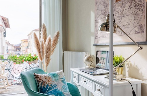 Lucca Historical Center Apartment | Casa Gina, a modern charming urban retreat with free parking by the train station and the Walls of Lucca