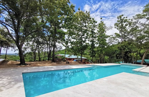 Rio Seco House | Casa Illimani pool side gorgeous mountain ocean views from hilltop