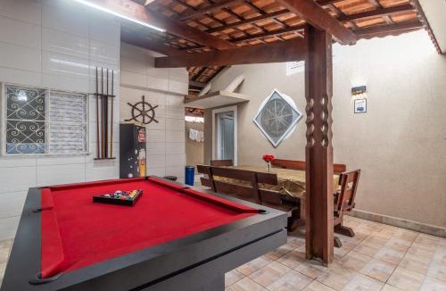 Jardim Real House | Casa Lindíssima e Espaçosa com 2 Piscinas - Adulto e Infantil, Perto da Praia, Opção da Piscina Adulto Aquecida Cobrado à Parte, 4 Quartos Frente as Piscinas, Área Gourmet Completa com Churrasqueira, Forno e Fogão a Lenha, Mesa de Bilhar, Lareira na Sala