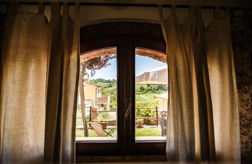 Montescudaio Apartment | Casetta Luna e Sole Giardino privato e vista Toscana