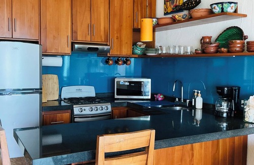 Puerto Morelos Condo | Casita Blanca gem overlooking a gorgeous pool and the Caribbean Sea!