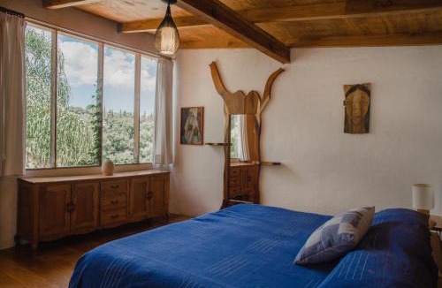 Uruapan Apartment | CASITA TECA jardín de esculturas junto al río