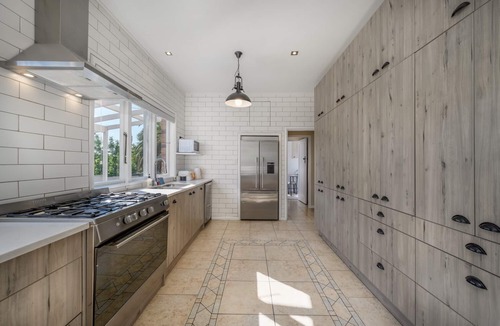 Papatoetoe House | Castle Charm with Modern Interiors– Steps to Shops