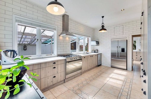 Papatoetoe House | Castle Charm with Modern Interiors– Steps to Shops