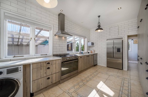 Papatoetoe House | Castle Charm with Modern Interiors– Steps to Shops