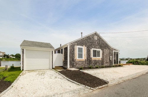 Centerville Cottage | CENTERVILLE RIVER WATERFRONT! DOCK AND DIRECT LONG BEACH ACCESS! Pet Friendly.