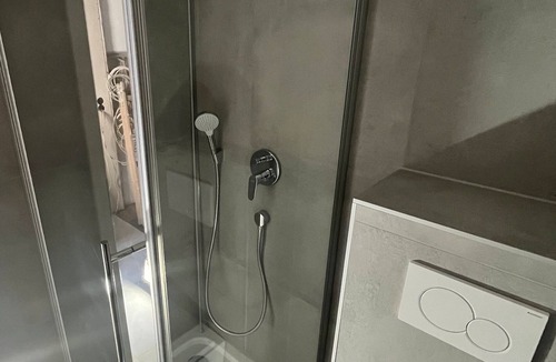 Seelberg Apartment | Central 1-room apartment kitchen, washing machine, parking space, flexible sleeping area