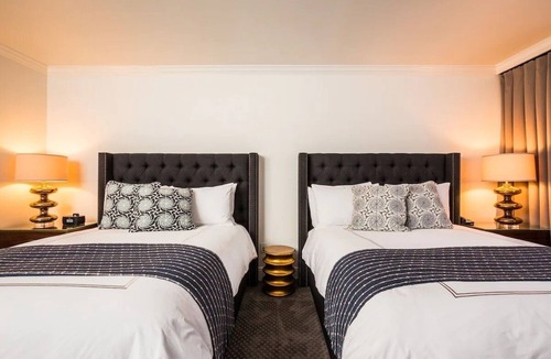 West Campus Hotel | Central Austin Stay: Historic Hotel w/Outdoor Pool - Close to UT Austin Stadium