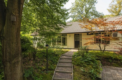 Lieren House | Central luxury group villa with hot tub, five bedrooms, large kitchen, and enclosed garden. Plenty of privacy and comfort inside and out.