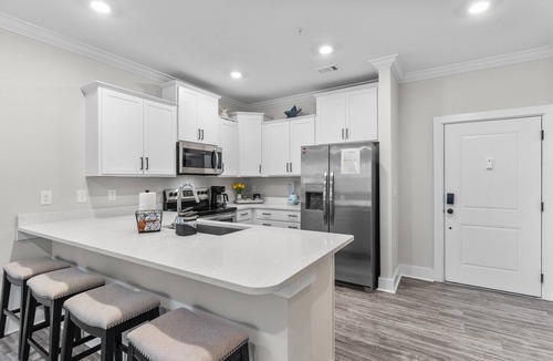 Calabash Condo | Centrally located condo with a patio, W/D, & AC - pool and on-site golf access