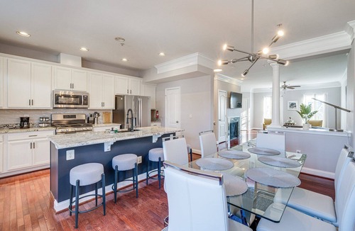 Laurel House | Centrally located Spacious 4-bedroom townhome in tranquil Laurel with AC.