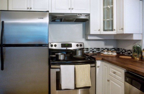 Fairview Condo | Centrally Located Warmingly Cozy and Spacious Home