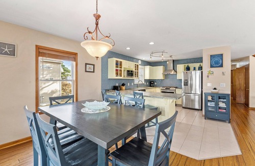 Colington Harbour House | CH73: Coastal Kaleidoscope water view home with boat dock close to beach