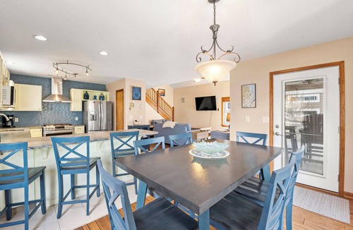 Colington Harbour House | CH73: Coastal Kaleidoscope water view home with boat dock close to beach