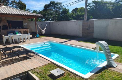 Caravelas House | Chalé com Piscina e Churrasqueira Privativos