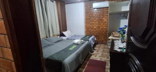 Bairro Lago Negro Hotel | Chalé das Neves