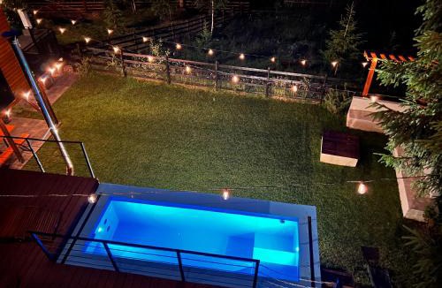 Muntele Baisorii House | Chalet A Baisoara - Luxury A-Frame cu Piscină Încălzită