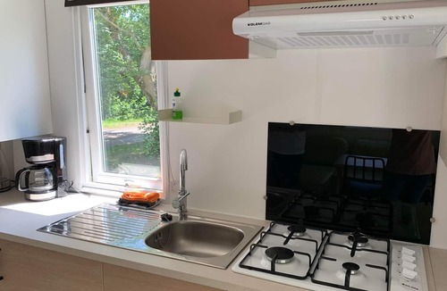 Mittelhof Apartment | Chalet Eichhörnchen - Camping im Eichenwald