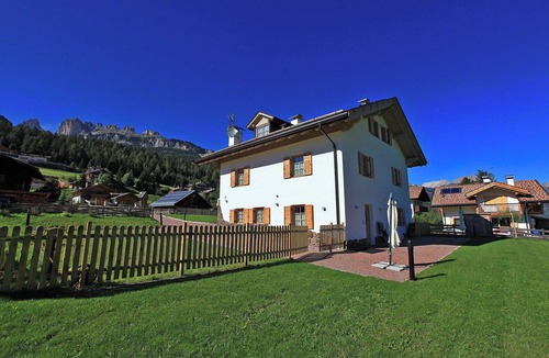 Vigo di Fassa Apartment | Chalet Nata: your panoramic retreat in the Dolomites of Val di Fassa