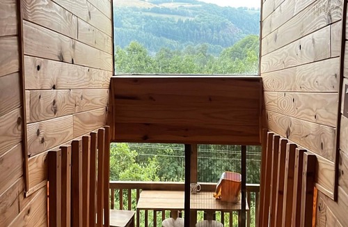 Villefranche-de-Panat Ski Chalet | Chalet perched between river and lake