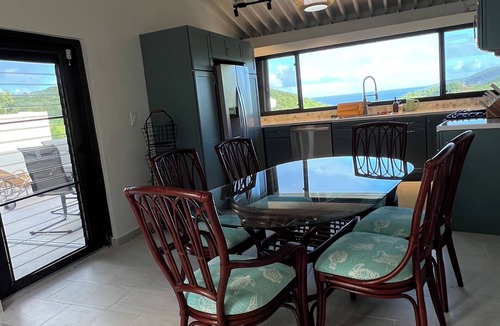 Estate Lovenlund Condo | Changes in Latitude 18.3 spacious Mahogany Run condo with ocean views.