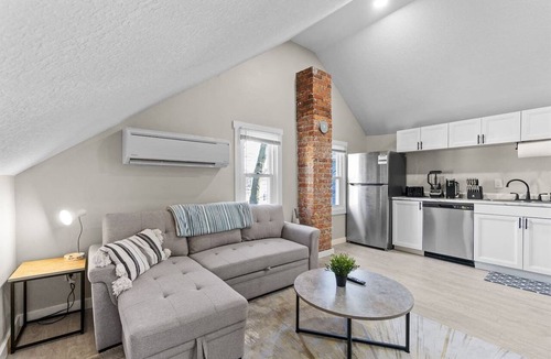West Central Apartment | Character-Filled Downtown Apartment | Brick & Wood Details