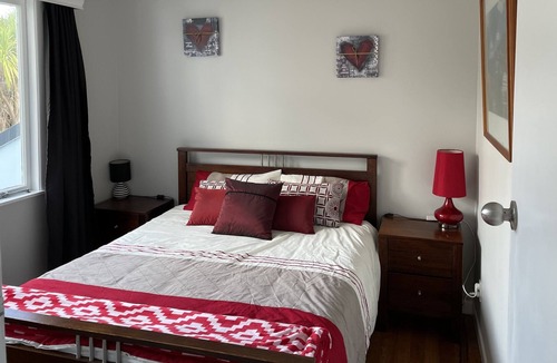 Onerahi House | Character home with beautiful land and sea views with stunning sunsets