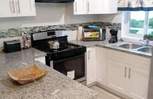 Great Harbour Cay Apartment | Charming 1-bedroom resort with indoor fireplace.