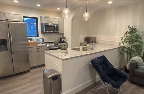 Kennedy King Apartment | Charming 1-bedroom carriage house apartment with private garage