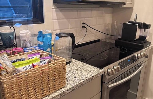 Kennedy King Apartment | Charming 1-bedroom carriage house apartment with private garage