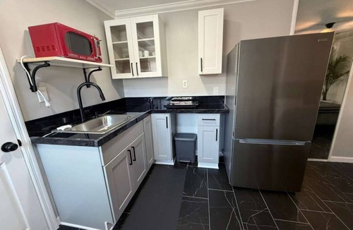 Dolphin's Cove House | Charming 1-bedroom townhome in Palm Valley with outdoor shower