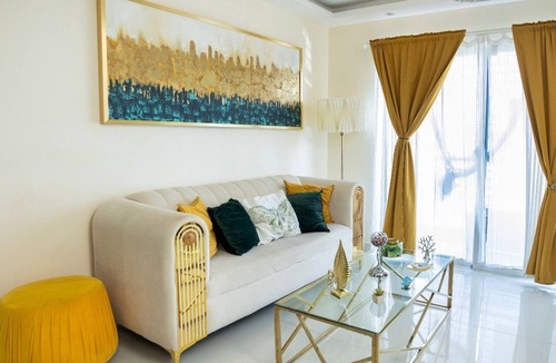 Prado Oriental House | Charming 2-bedroom building in Tranquil Santo Domingo Este with AC