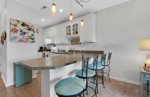 Pensacola Beach Condo | Charming 2 Bedroom Condo on the Water with Sunset Views