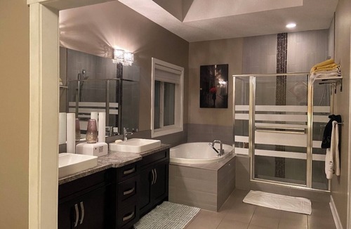 Chestermere House | "Charming 2-Bedroom, 2-Bathroom Sanctuary: Your Upstairs Retreat Awaits!"