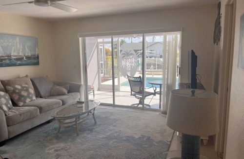 Pelican Condo | Charming 2-bedroom condo with WiFi, in Cape Coral with pool, spa, & water view.