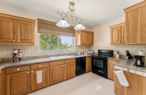 Fitts Village Condo | CHARMING 2 BEDROOM CONDO WITH SPECTACULAR WEST COAST SUNSET VIEW