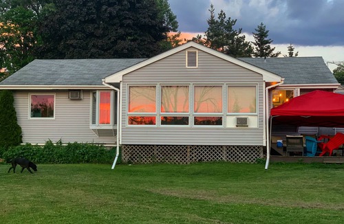 Williston South House | Charming 2-bedroom house close to the interstate with pond and WiFi in Williston