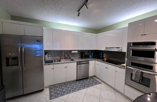 Surfside Condo | Charming 2-bedroom Luxury Condo on the sand with amazing unobstructed views.