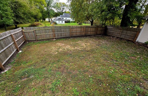 East Moline House | Charming 2-bedroom house with fenced in yard-East Moline