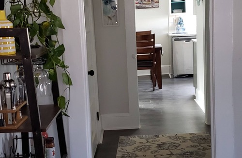 East Spencer House | Charming 2-bedroom vintage cottage with WiFi, a/c, and other popular amenities.