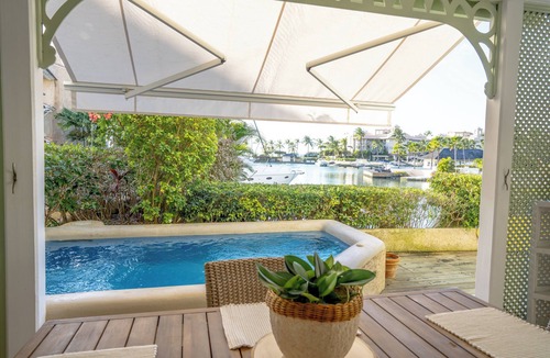 Douglas Villa | Charming 2-brm WATERFRONT Villa with WiFi, AC, & Pool in PORT ST CHARLES MARINA!