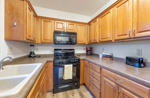 North Liberty House | Charming 2bed, 1.5bath home with fire pit, near trails, dining, and key landmark