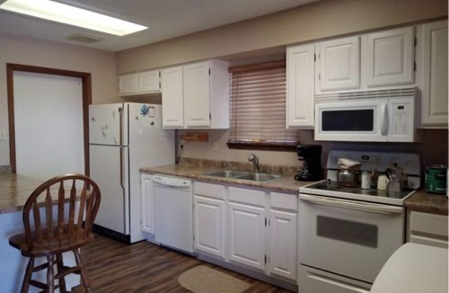 Elephant Butte House | Charming 3 Bedroom house w/fire pit, water fall, outdoor grill, wrap around deck