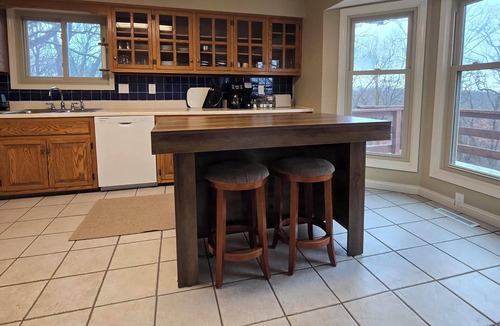 Warrensburg House | Charming 3-bedroom farmhouse with large front and back decks. Fenced in backyard
