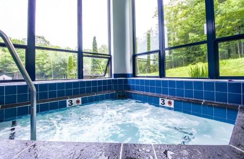 Killington Apartment | Charming 3BR-2BA Condo in Sunrise Village at Ski Resort, Pool, Hot Tub, Sports Center