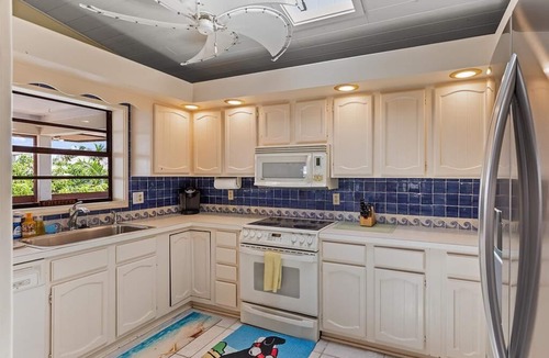 Venetian Shores House | Charming 3BR canal home in Plantation Key, perfect for family getaways.