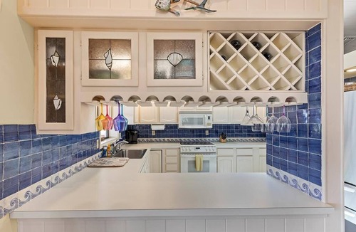 Venetian Shores House | Charming 3BR canal home in Plantation Key, perfect for family getaways.