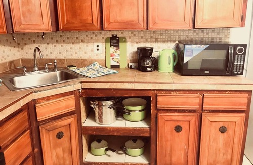 Queens House | Charming 4-bedroom, 2 bath, balcony townhome in Queens
